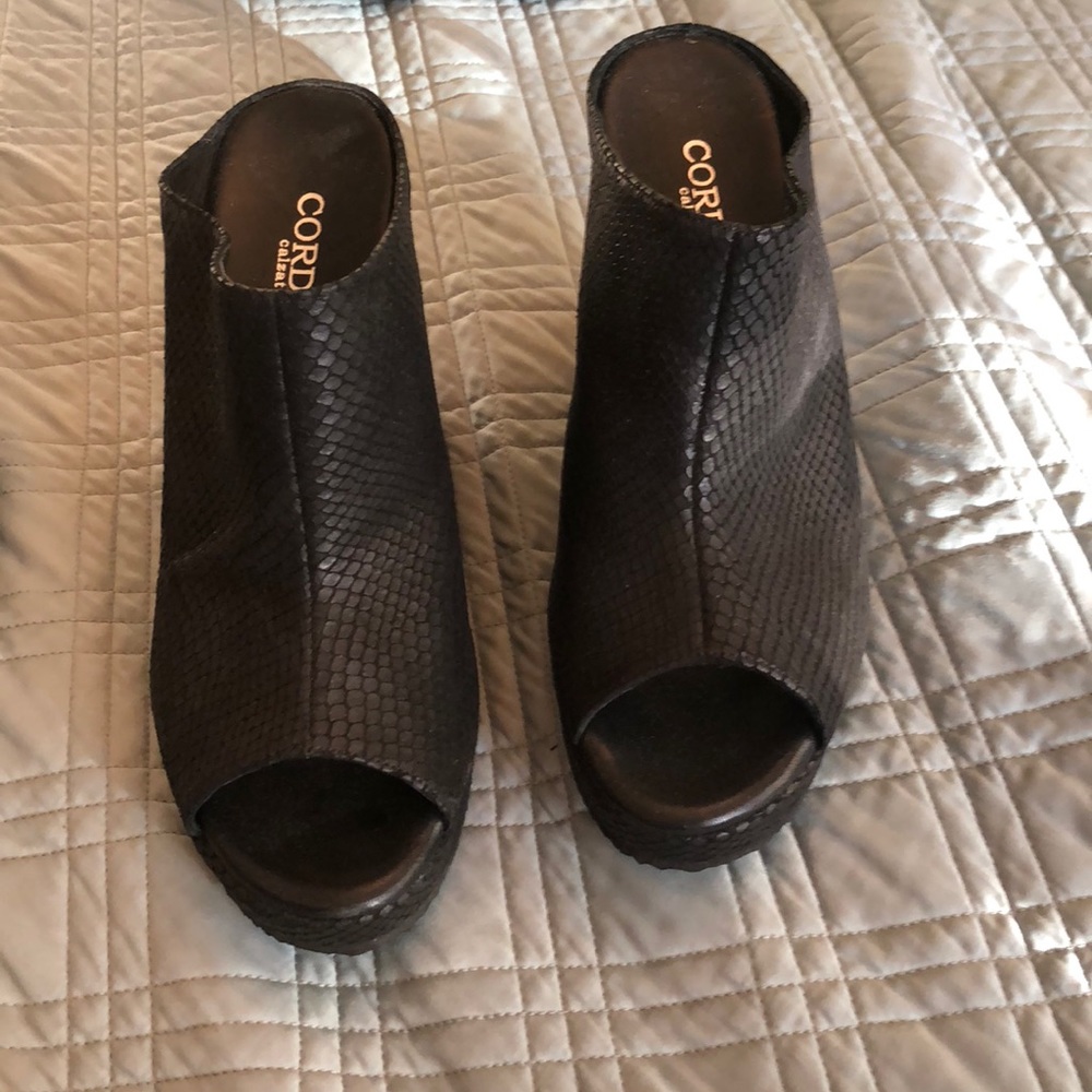 Cordani black leather wedges. 3 inches.